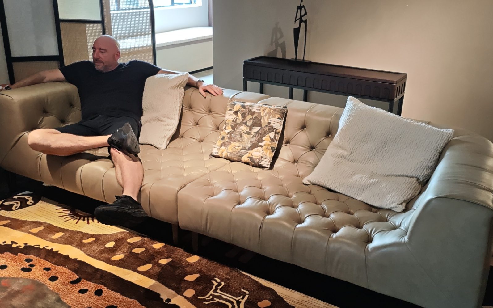 Source-From-Foshan team showing furniture to visiting clients