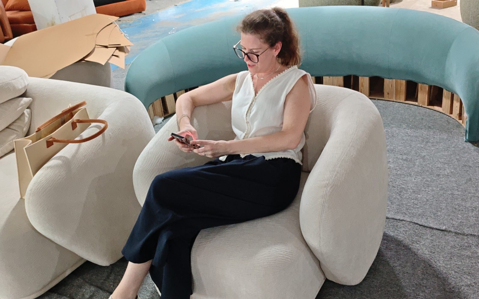 Client selecting fabrics and finishes at a Lecong showroom